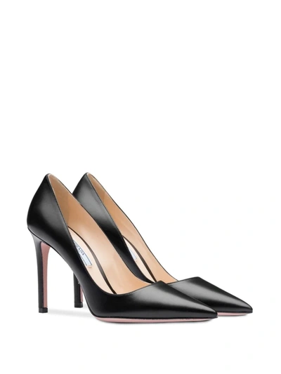 Shop Prada Leather Pumps In Black