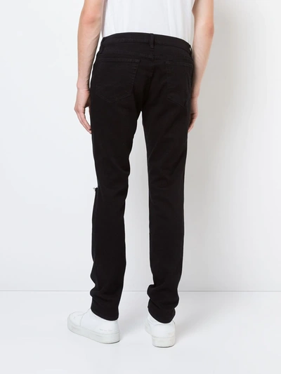 Shop Frame L'homme Skinny Jeans