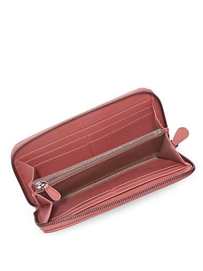 Shop Bottega Veneta Woven Zip-around Wallet In Red