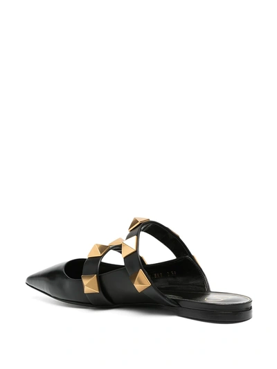 Shop Valentino Roman Stud Flat Mules In Black