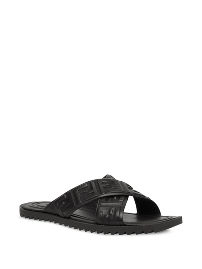 Shop Fendi Embossed Ff Motif Flat Sandals In Black