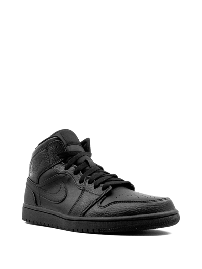 Shop Jordan Air  1 Mid "triple Black" Sneakers