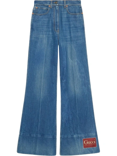 Shop Gucci Logo-patch Flared Denim Jeans In Blue