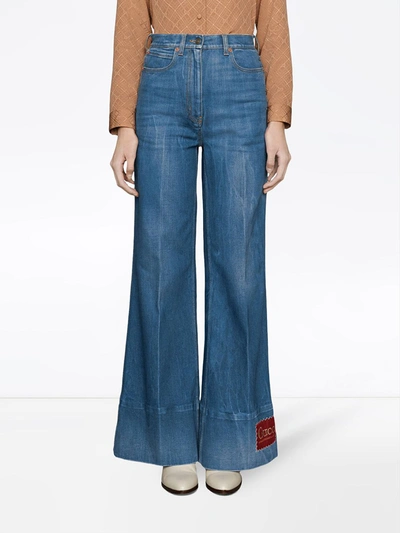 Shop Gucci Logo-patch Flared Denim Jeans In Blue