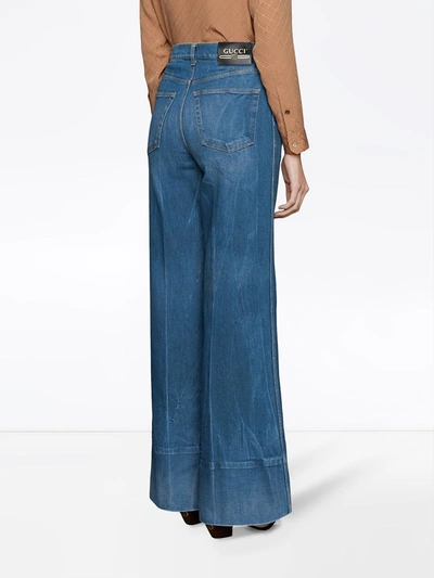 Shop Gucci Logo-patch Flared Denim Jeans In Blue