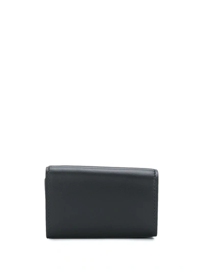 Shop Moschino Logo Print Wallet In Black
