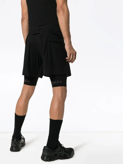 Shop Satisfy Justice™ 10" Trail Shorts In Black