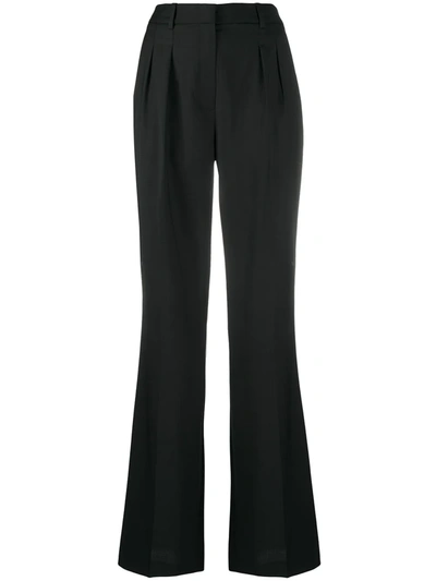 Shop Loulou Flared Wool Trousers In Black