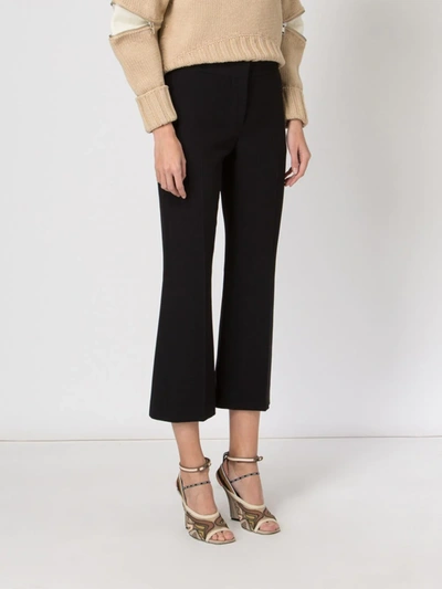 Shop Alexander Mcqueen Cropped Flared Trousers In Black