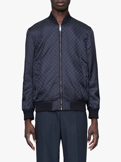 Shop Gucci Gg Pattern Reversible Bomber In Blue
