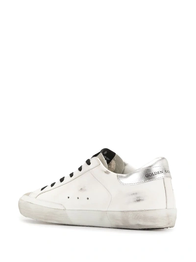 Shop Golden Goose Super-star Distressed Low-top Sneakers In White