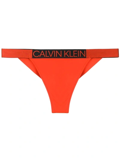 Shop Calvin Klein Logo Printed Briefs In Orange
