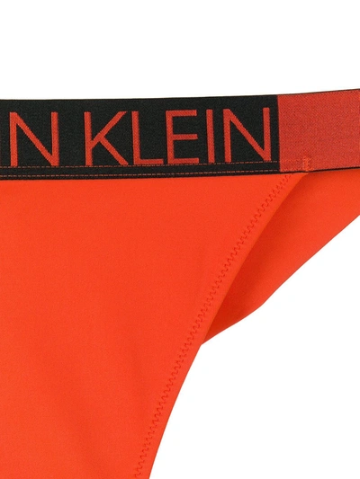 Shop Calvin Klein Logo Printed Briefs In Orange