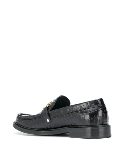 Shop Moschino Lettering Logo Loafers In Black