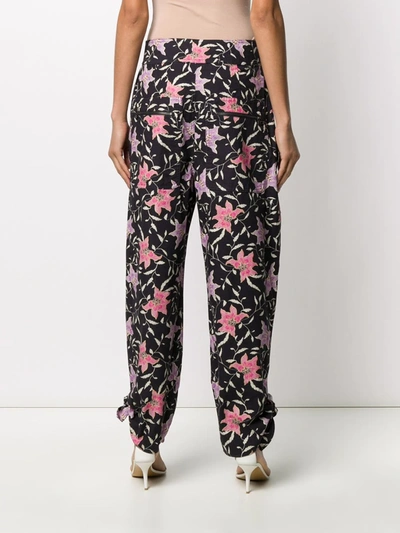 Shop Isabel Marant Gaviao Floral-print Tapered Trousers In Black