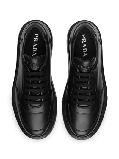 Shop Prada Logo Low-top Sneakers In Black