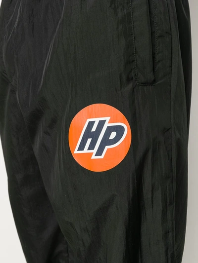 Shop Heron Preston Logo-print Trousers In Black