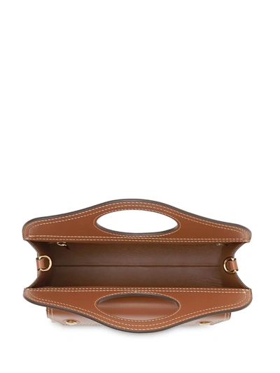 Shop Burberry Mini Topstitch Detail Leather Pocket Bag In Brown