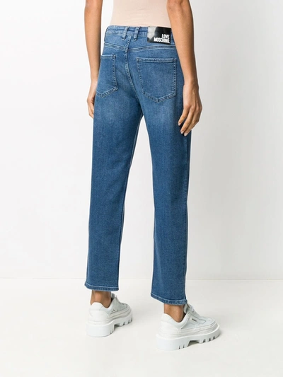 Shop Love Moschino Logo Print Straight-leg Jeans In Blue