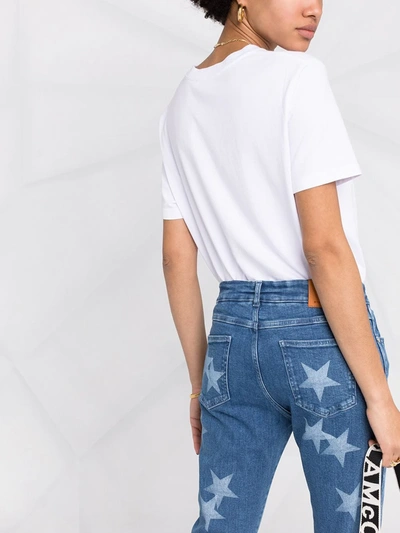 Shop Stella Mccartney Star-print Slim-fit Jeans In Blue