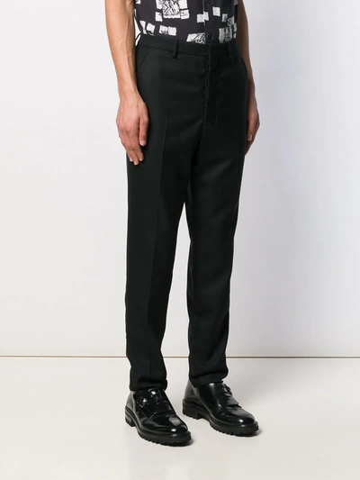 Shop Ami Alexandre Mattiussi Men Carrot Fit Trousers In Black