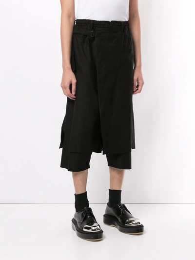 Shop Yohji Yamamoto Wrap-front Cropped Trousers In Black