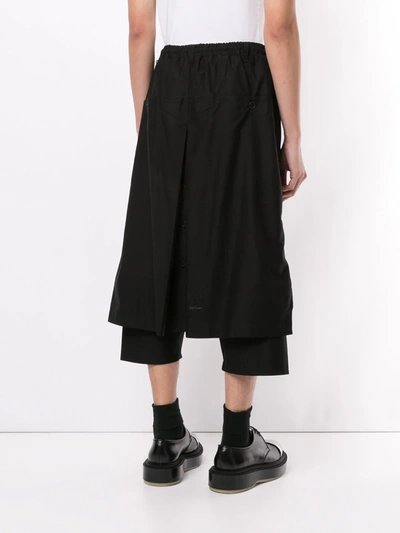 Shop Yohji Yamamoto Wrap-front Cropped Trousers In Black