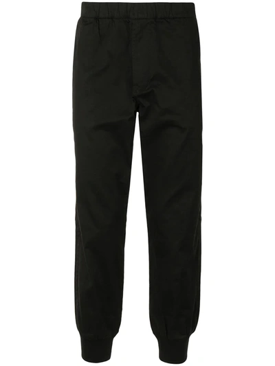 Shop Aape By A Bathing Ape Tapered Cut Elasticated Trousers In Black
