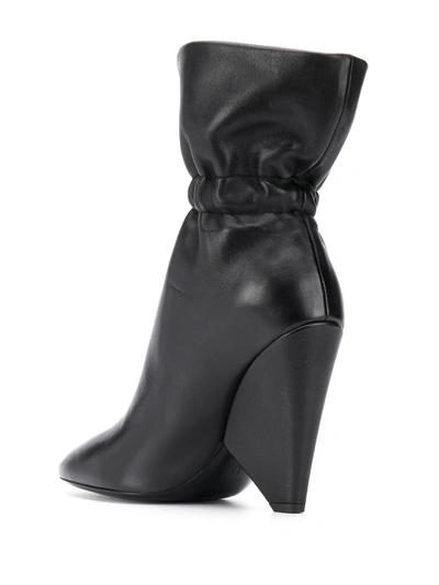 Shop Saint Laurent Elasticated Detail Ankle Boots In Black