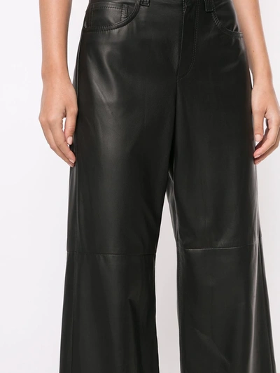 Shop Brunello Cucinelli Faux Leather Wide Leg Trousers In Black