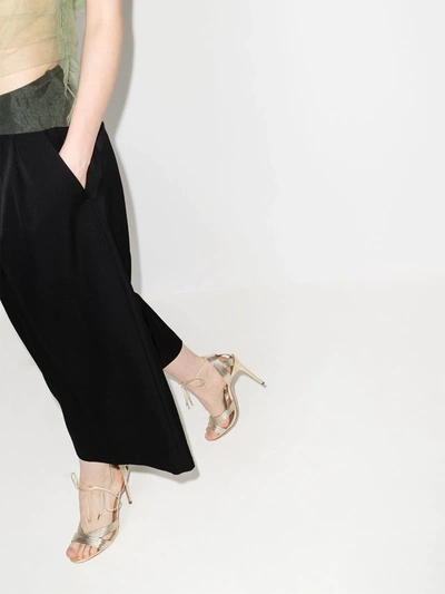 Aquazzura Ari 105 Wrap-around Sandals In Laminated Leather In Gold