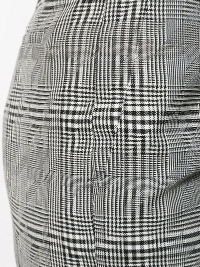 Shop Versace High-rise Check Trousers In Black