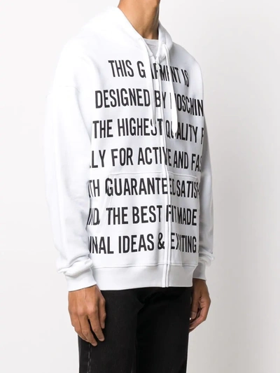 Shop Moschino Slogan-print Zip-front Hoodie In White