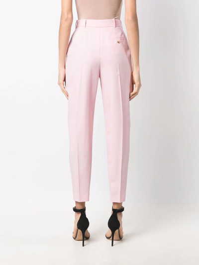 Shop Alexander Mcqueen High-waisted Tapered Trousers In Rosa