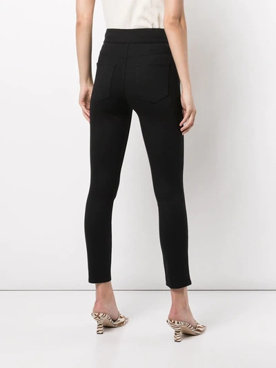 Shop Spanx Skinny-cut Ponte Trousers In Black
