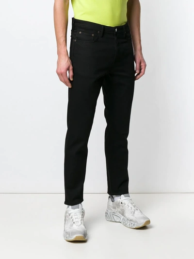 Shop Acne Studios River Tapered Jeans In Black