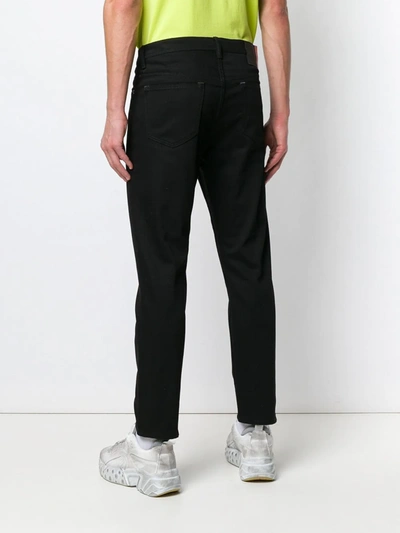 Shop Acne Studios River Tapered Jeans In Black