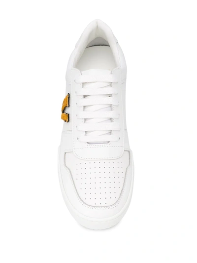 Shop Versace Ilus Virtus Sneakers In White