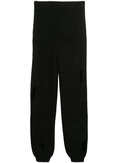 Shop Jeremy Scott Destroyed Knitted Track Pants In Black