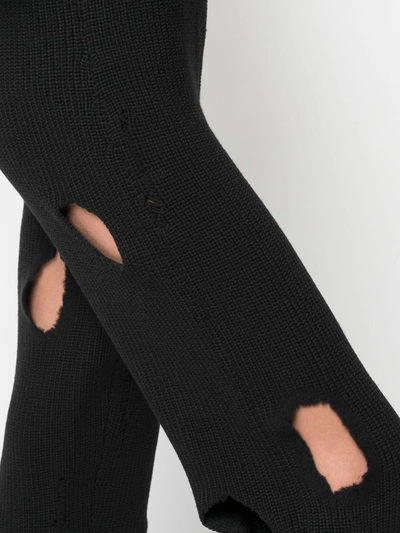 Shop Jeremy Scott Destroyed Knitted Track Pants In Black