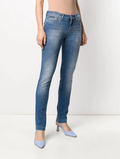 Shop Dolce & Gabbana Faded Effect Skinny Jeans In Blue