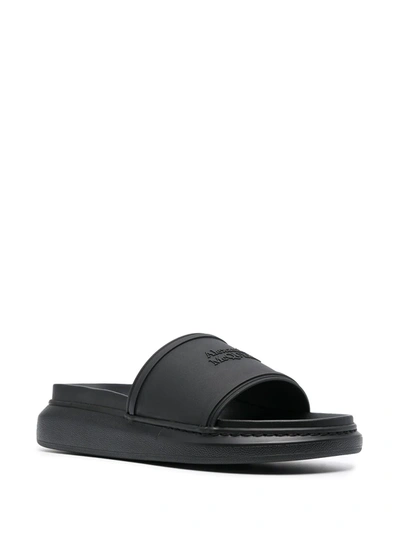 Shop Alexander Mcqueen Logo-detail Slip-on Slides In Black