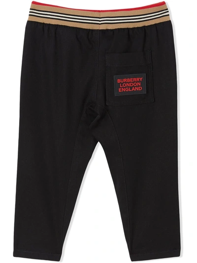 Shop Burberry Icon Stripe Drawstring Trousers In Black