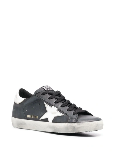 Shop Golden Goose Logo Patch Sneakers In Black