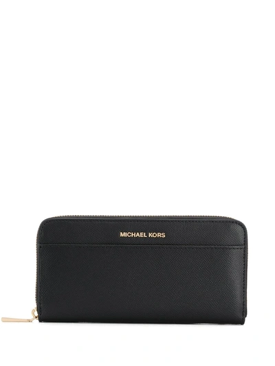 Shop Michael Michael Kors Textured Zip Wallet In Black