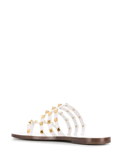 Shop Valentino Rockstud Flat Sandals In White