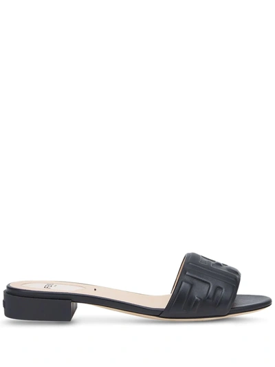 Shop Fendi Embossed Ff-motif Slip-on Sandals In Black