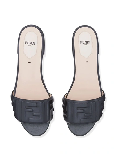 Shop Fendi Embossed Ff-motif Slip-on Sandals In Black
