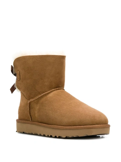 Ugg Mini Bailey Bow Ii Shearling Fur Boots In Brown