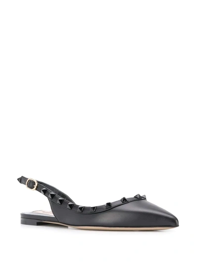 Shop Valentino Rockstud Slingback Slippers In Black